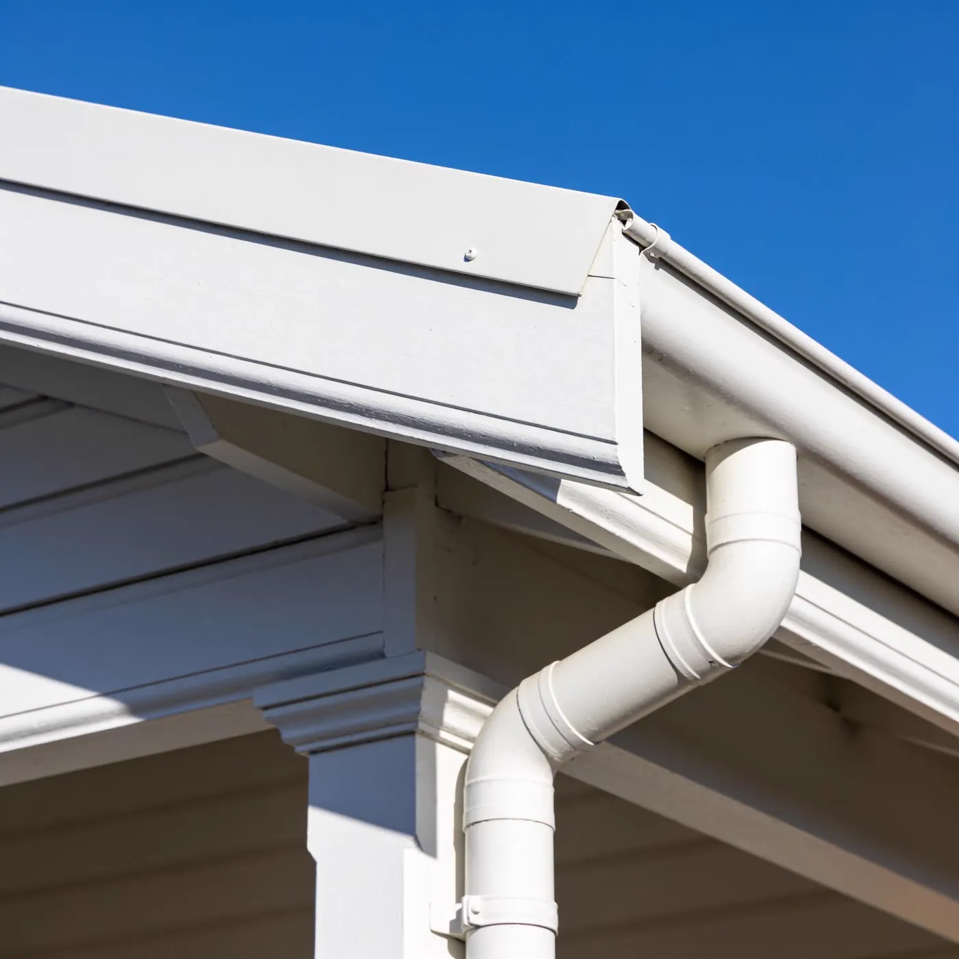 Crisp freshly painted white eaves, fascia and gutter line